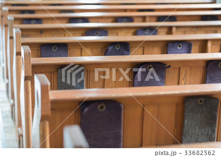 Pews in an old church. Pews in an old church. 33682562