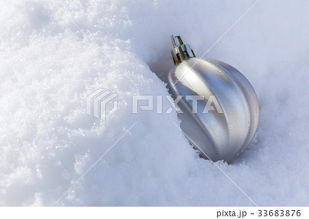 Silver glitter ball on silver background. Silver glitter ball on silver background. 33683876