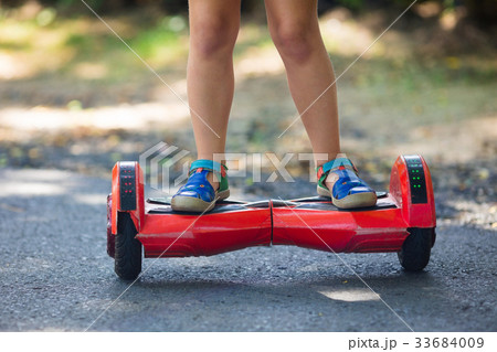 Child on hover board. Kids ride scooter. Child on hover board. Kids ride scooter. 33684009