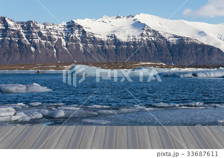 Beauty ice winter lagoon with mountain volcano Beauty ice winter lagoon with mountain volcano 33687611
