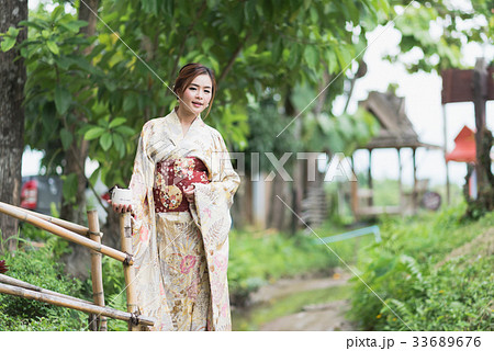 The girl cute with japanese yukata The girl cute with japanese yukata 33689676