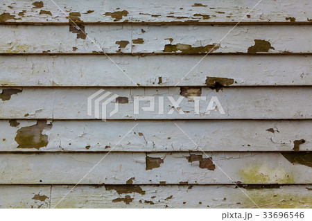 Old wooden board painted white. 33696546