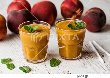 Healthy beverage - fresh blended peach smoothie 33697602