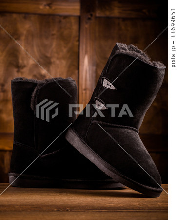 Close up view of pair of winter boots. 33699651