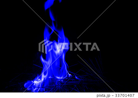 Abstract blue fire flames on dark background. Abstract blue fire flames on dark background. 33701407