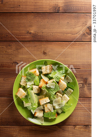 caesar salad in plate at wood caesar salad in plate at wood 33701997