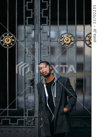Suspicious black male. Urban life Suspicious black male. Urban life 33702235