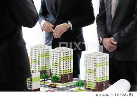 Business meeting of architects and investors Business meeting of architects and investors 33702598