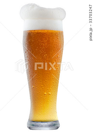 Mug of frosty beer with foam 33703247
