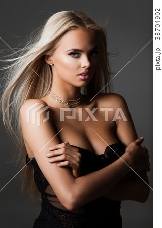 blond hair on grey 33704902