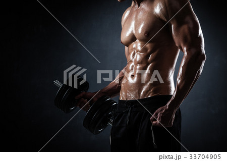 Athletic male with dumbbells Athletic male with dumbbells 33704905