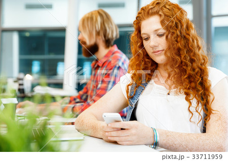 Creative business woman in office 33711959