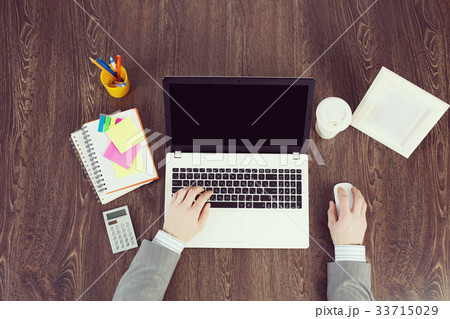 Office workplace with office supplies and laptop 33715029