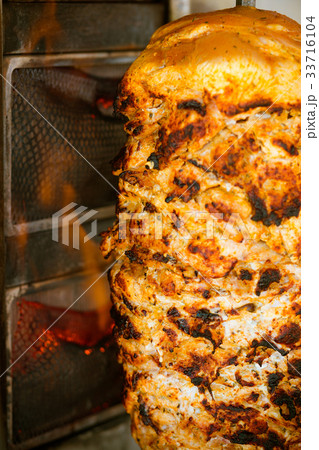 Chicken meal roasted on the fire 33716104