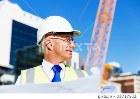Engineer builder at construction site Engineer builder at construction site 33717832