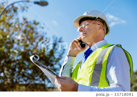 Engineer builder at construction site Engineer builder at construction site 33718091
