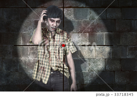 Weapon aiming to shooting bloody asian zombie man Weapon aiming to shooting bloody asian zombie man 33718345