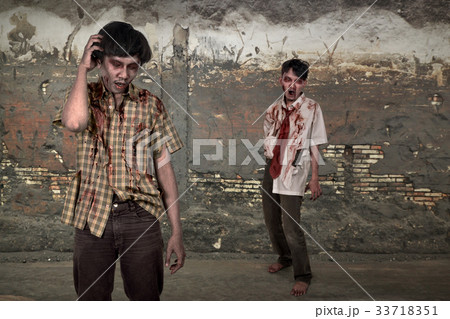 Horrible two asian zombies with blood standing Horrible two asian zombies with blood standing 33718351