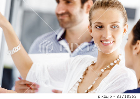 Business people in modern office Business people in modern office 33718565