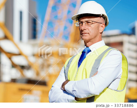 Engineer builder at construction site Engineer builder at construction site 33718886