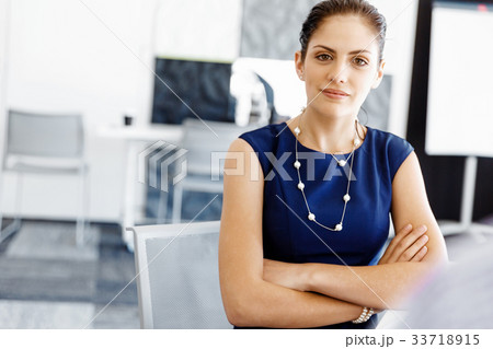Businesswoman working in office 33718915
