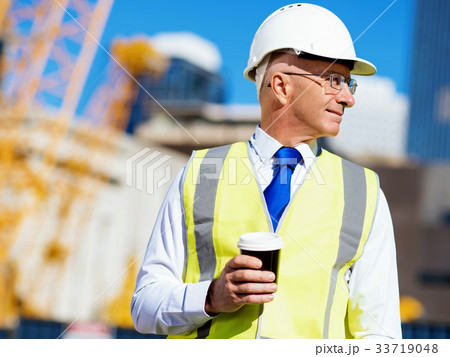 Engineer builder at construction site Engineer builder at construction site 33719048