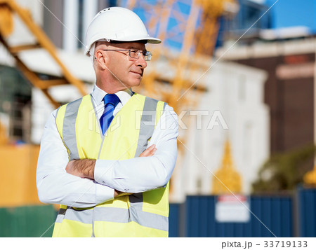 Engineer builder at construction site Engineer builder at construction site 33719133
