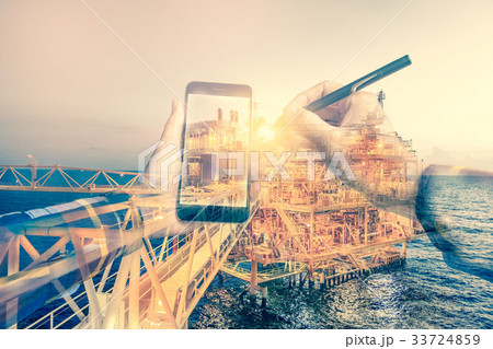 Double exposure of refinery oil and gas background 33724859