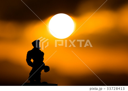 Silhouettes of muscle with blur sunset background. Silhouettes of muscle with blur sunset background. 33728413