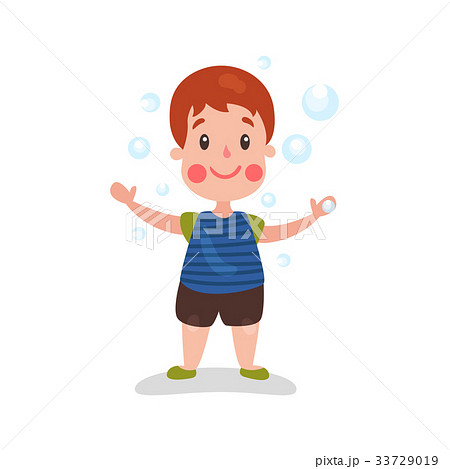 Cute cartoon redhead little boy having fun playing 33729019