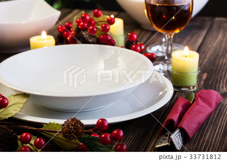 Christmas dishware on the table 33731812