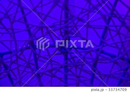 Texture of plastic rattan straw chair on color BG 33734709