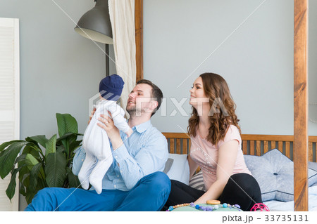 Happy Young Attractive Family with Baby. Happy Young Attractive Family with Baby. 33735131