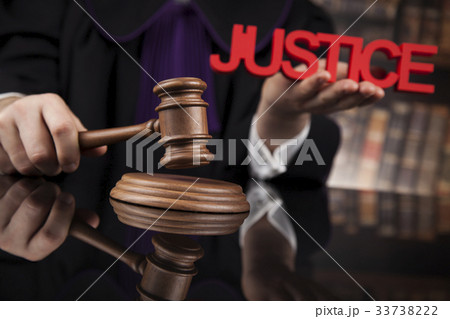 Law concept, Male judge in a courtroom striking Law concept, Male judge in a courtroom striking 33738222