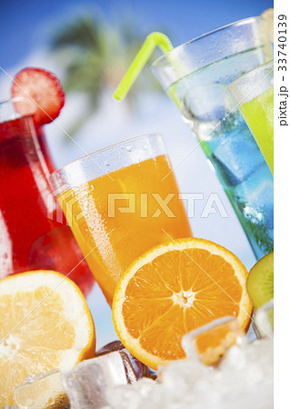 Summer drink,palm branch and Fresh tropical fruits Summer drink,palm branch and Fresh tropical fruits 33740139