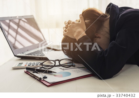 Stressed and frustrated asian business woman 33740432