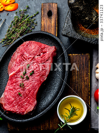 Fresh raw meat beef steak. Beef tenderloin, spices Fresh raw meat beef steak. Beef tenderloin, spices 33741123