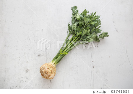 Celery. Fresh celery with top on concrete board. 33741632