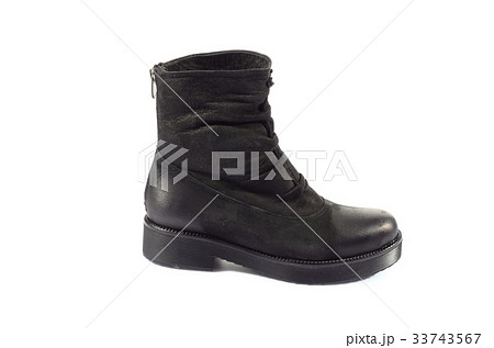 Pair of new hiking boots isolated on white Pair of new hiking boots isolated on white 33743567