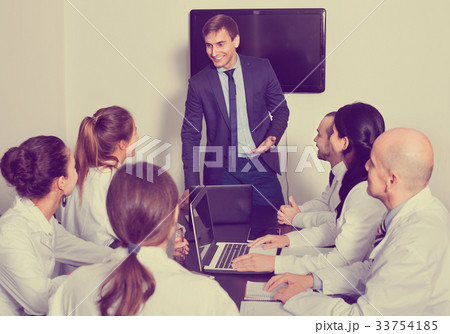 Manager making speech during business meeting 33754185