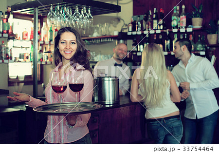 Portrait of smiling waitress Portrait of smiling waitress 33754464