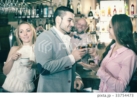 Couple drinking wine at bar 33754473