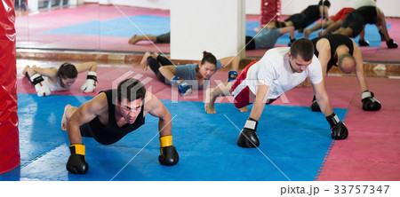 Sports people of different ages training 33757347