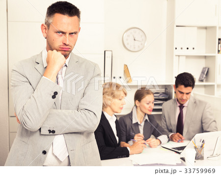 Angry manager dissatisfied with colleagues 33759969