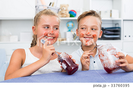 Friends are having lunch time and eating jam 33760395