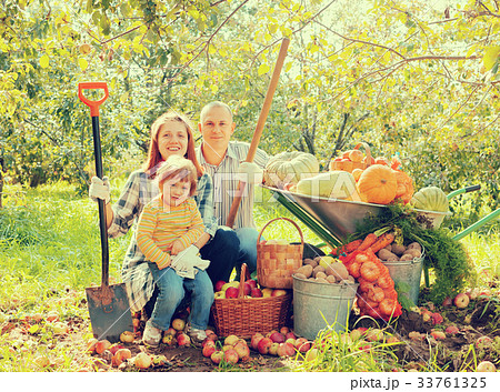 Happy parents and child in garden 33761325