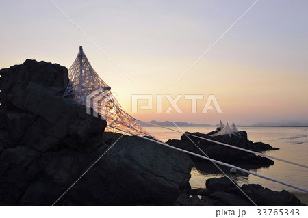 鏡 海 日の出 33765343