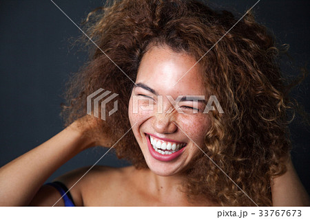 Portrait of a curly woman with freckles and naked 33767673
