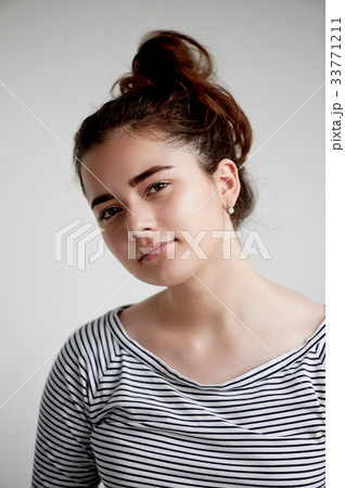 Portrait of young beautiful girl with brown eyes 33771211