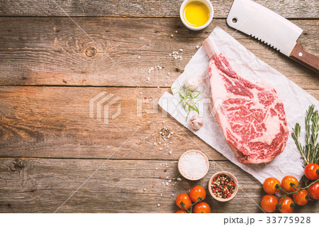 Raw tomahawk beef steak 33775928